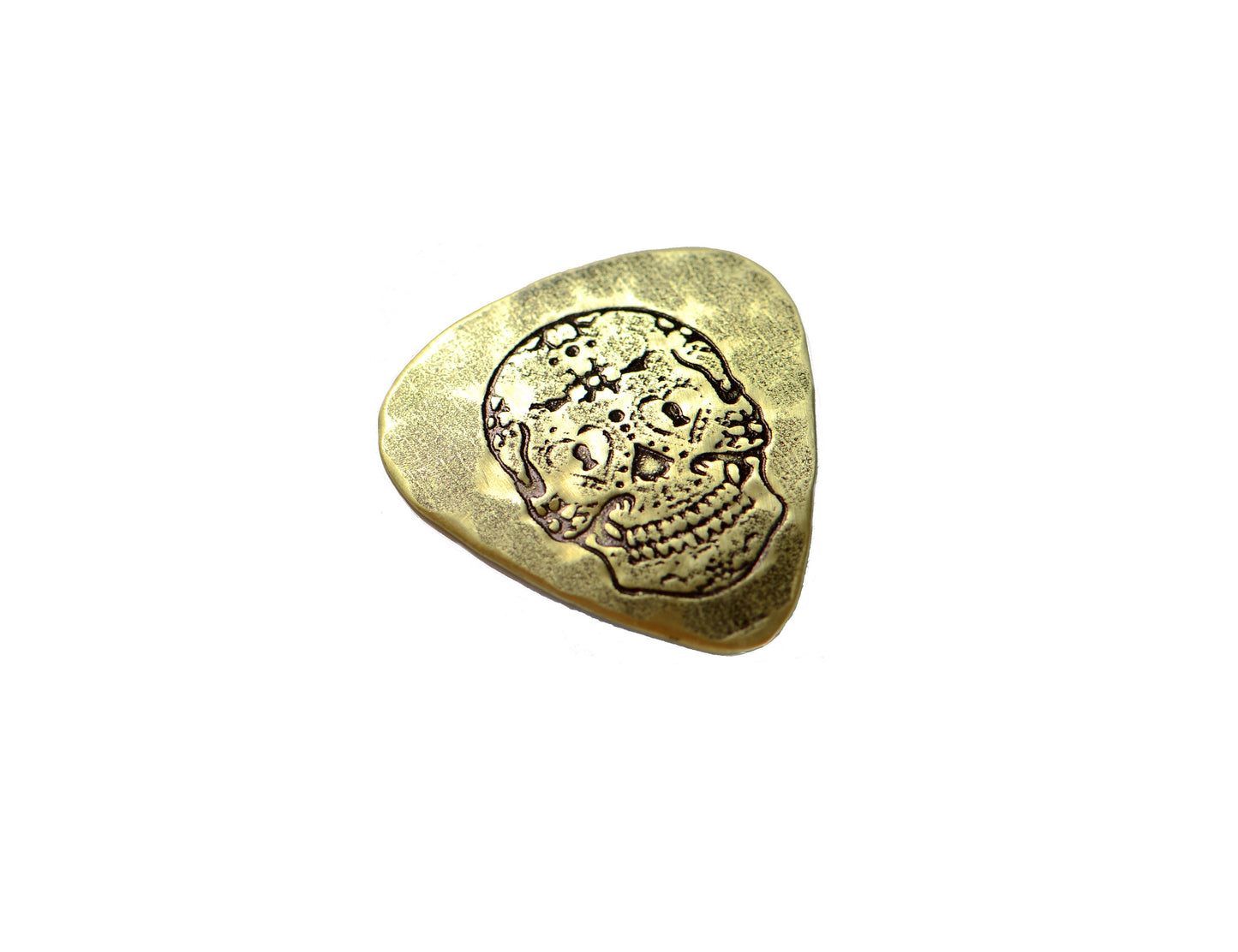 Playable brass guitar pick with sugar skull