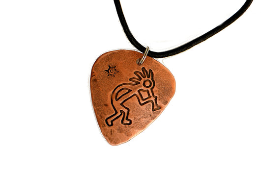 Kokopelli themed copper guitar pick necklace