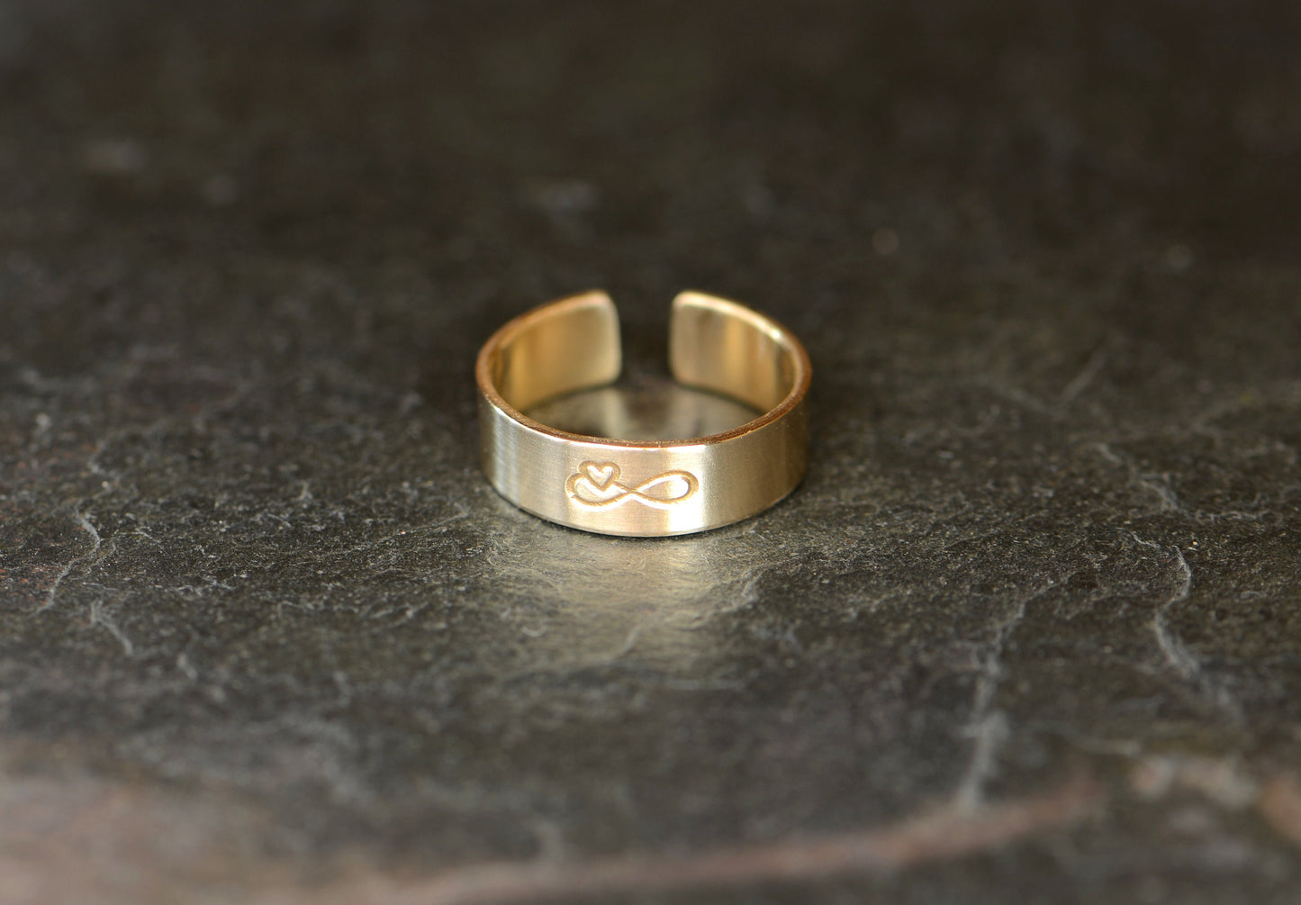 Infinity on solid 14k gold toe ring