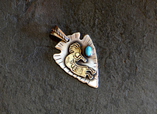 Sterling silver arrowhead necklace with brass Kokopelli and Blue sleeping beauty Turquoise