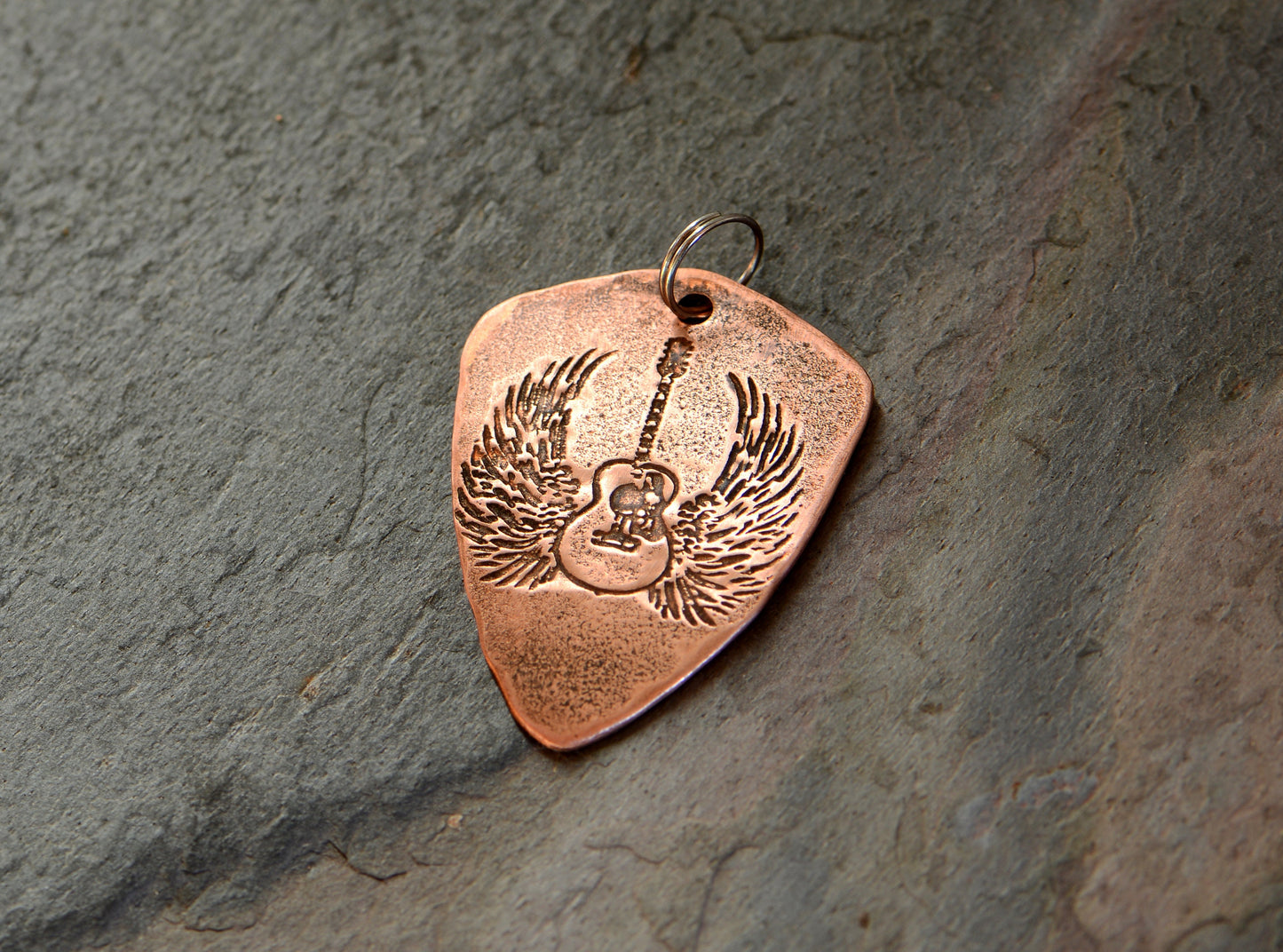 Shield shaped copper guitar pick