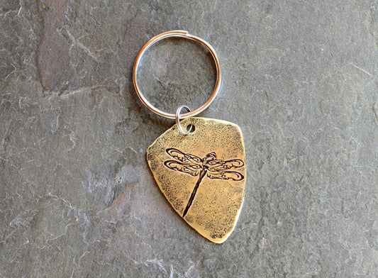 Brass dragonfly key chain in shield shape