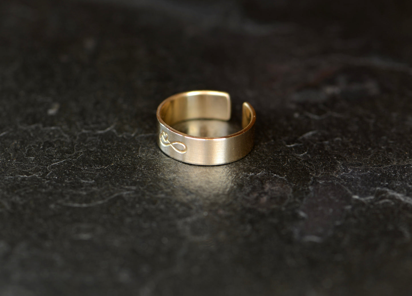 Infinity on solid 14k gold toe ring