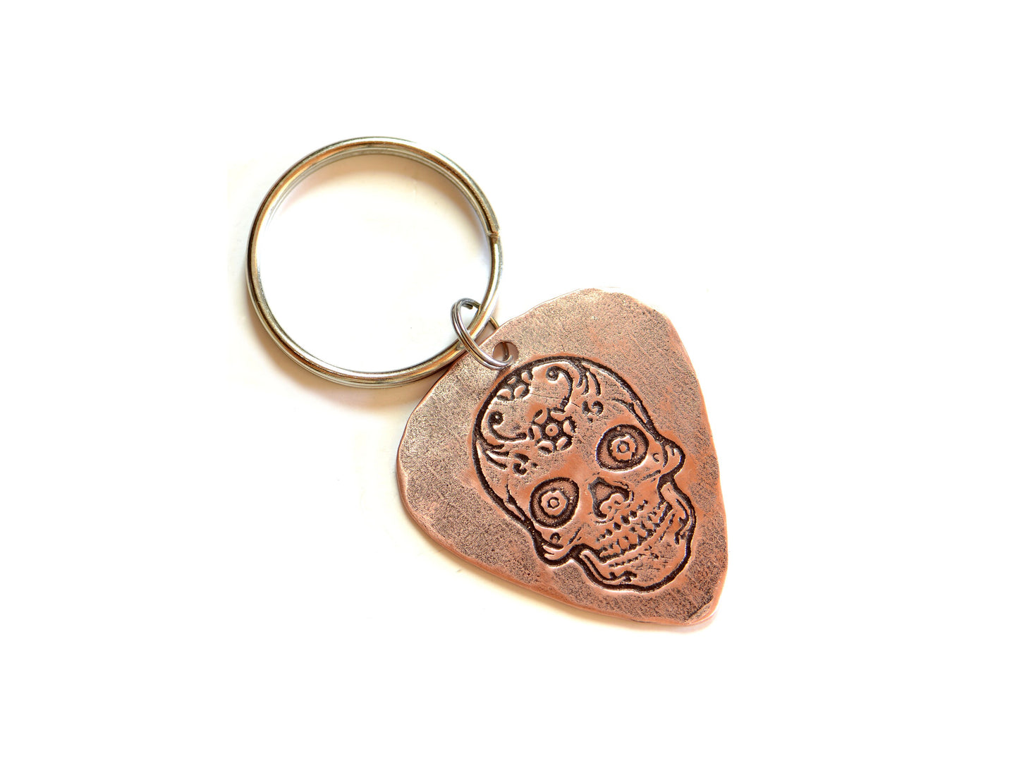 Copper guitar pick key chain with sugar skull