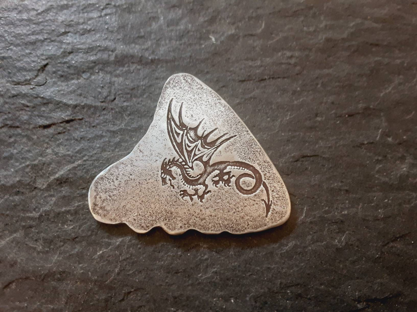 Sterling silver shark tooth guitar pick with dragon design
