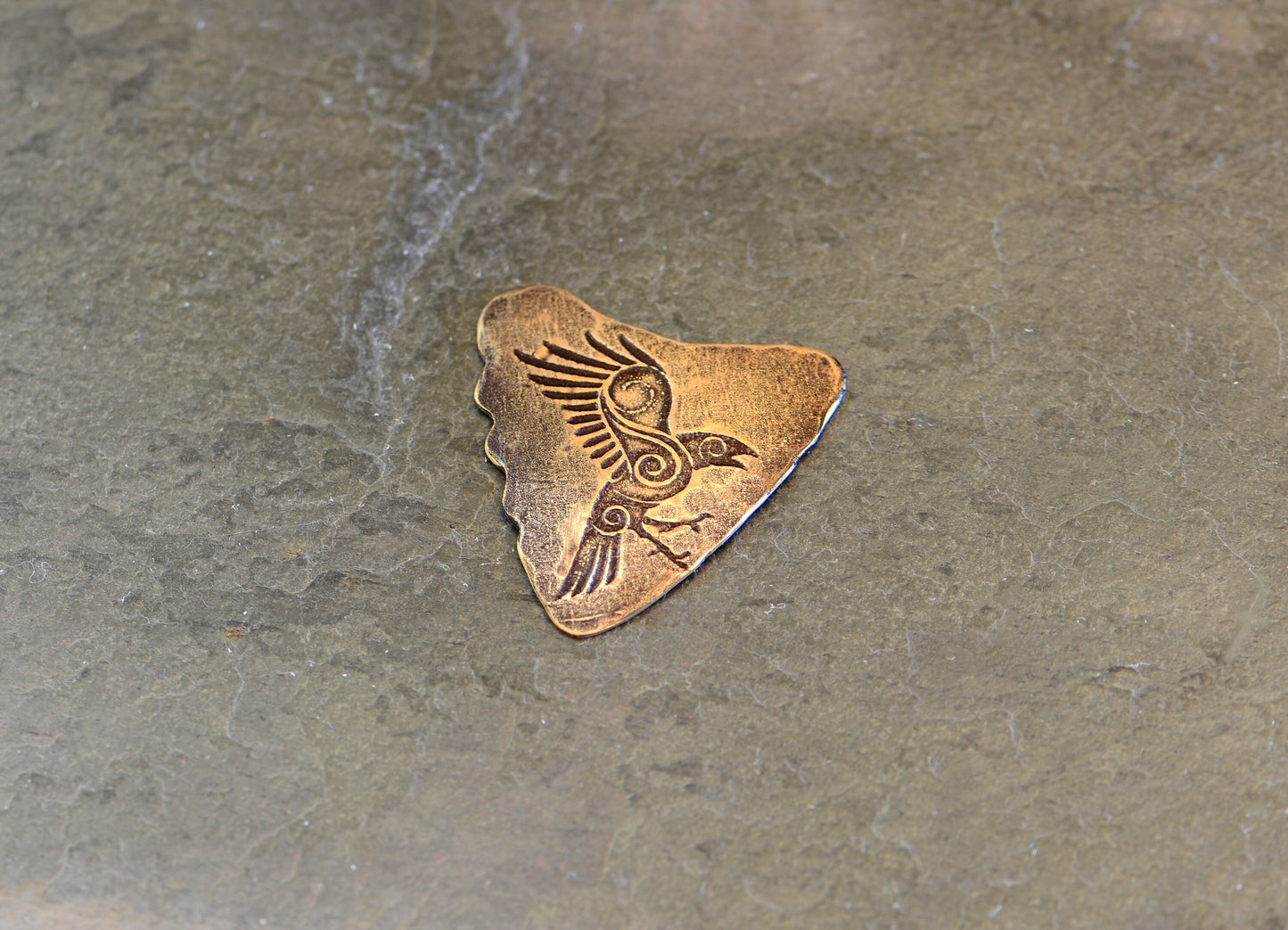 Shark fin bronze guitar pick with Norse raven