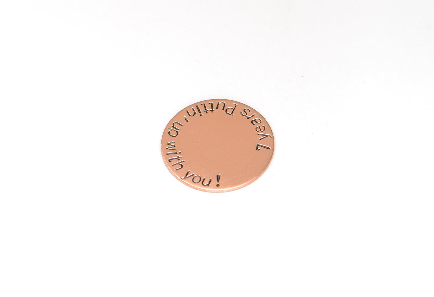 Copper golf ball marker for the 7th anniversary