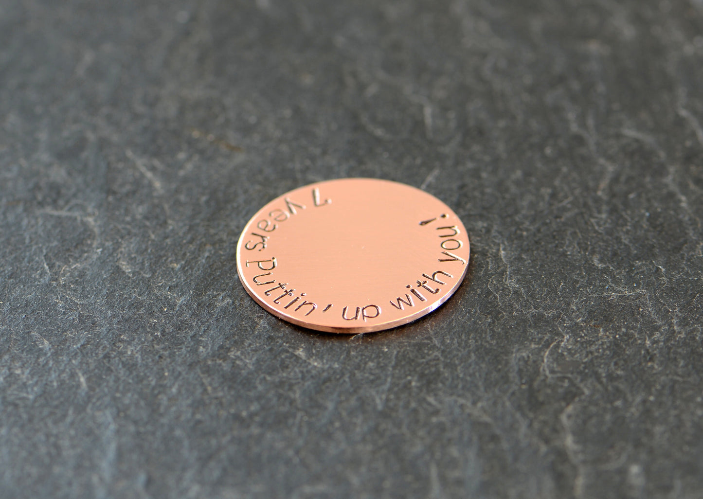 Copper golf ball marker for the 7th anniversary