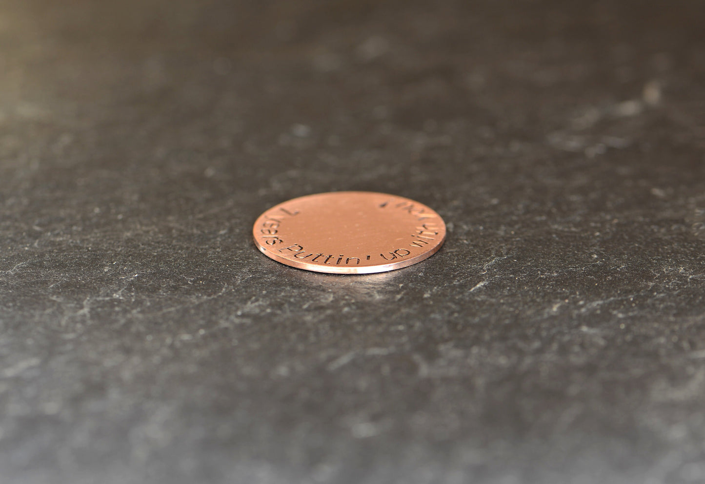 Copper golf ball marker for the 7th anniversary