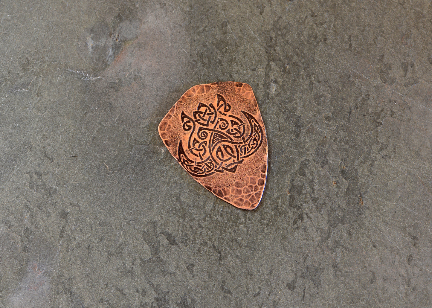 Celtic boar on copper guitar pick
