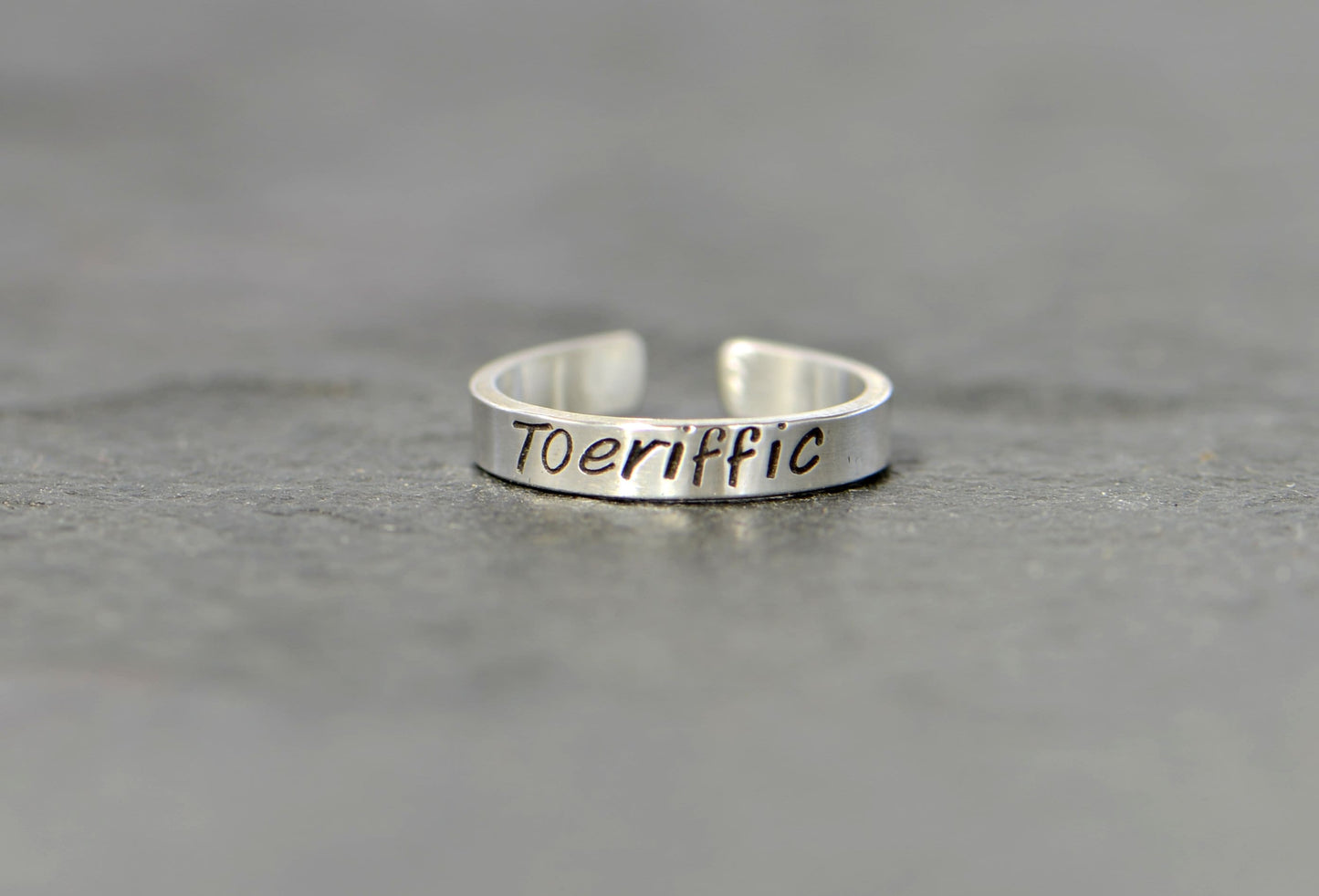 Sterling silver toe ring with "toeriffic"