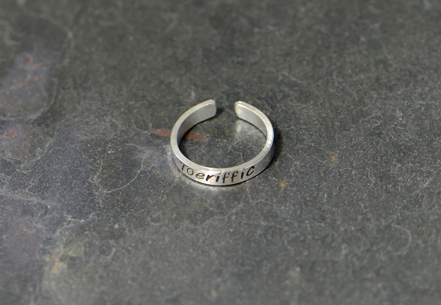 Sterling silver toe ring with "toeriffic"