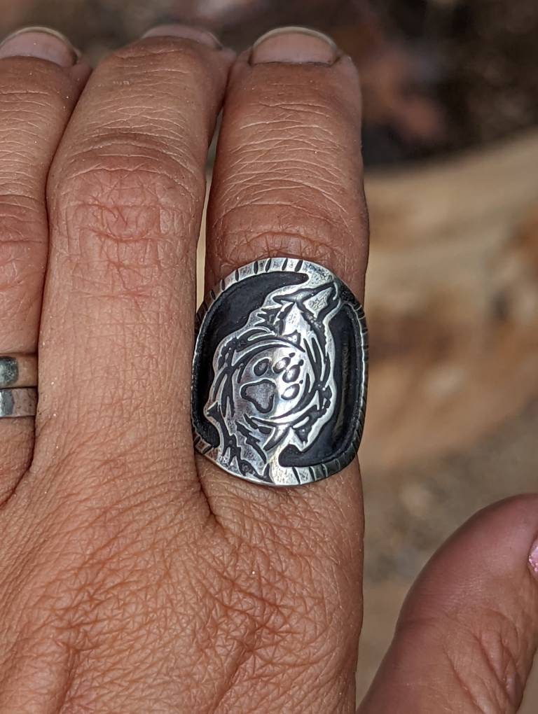 Wolf and paw shadow box saddle ring in sterling silver