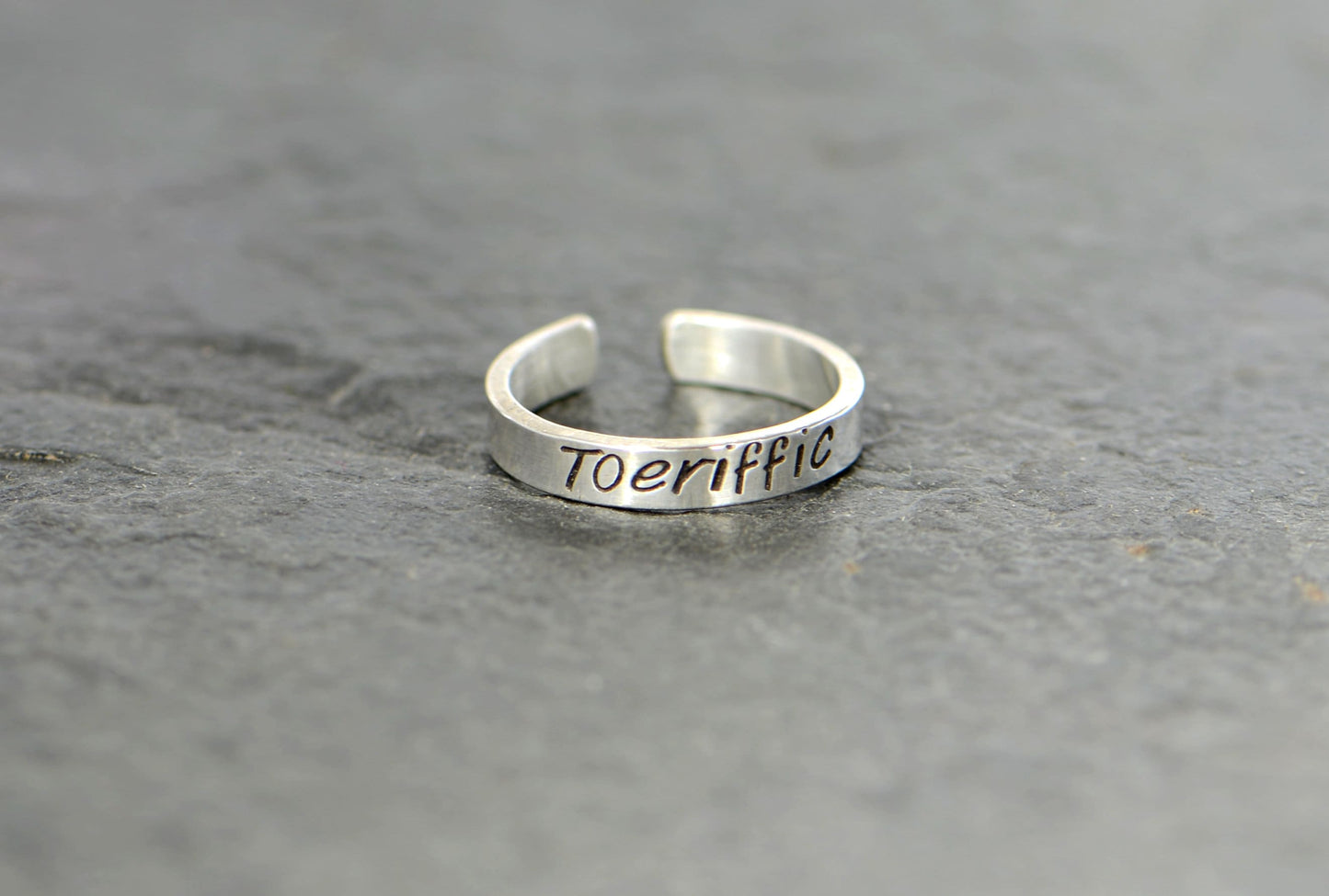 Sterling silver toe ring with "toeriffic"