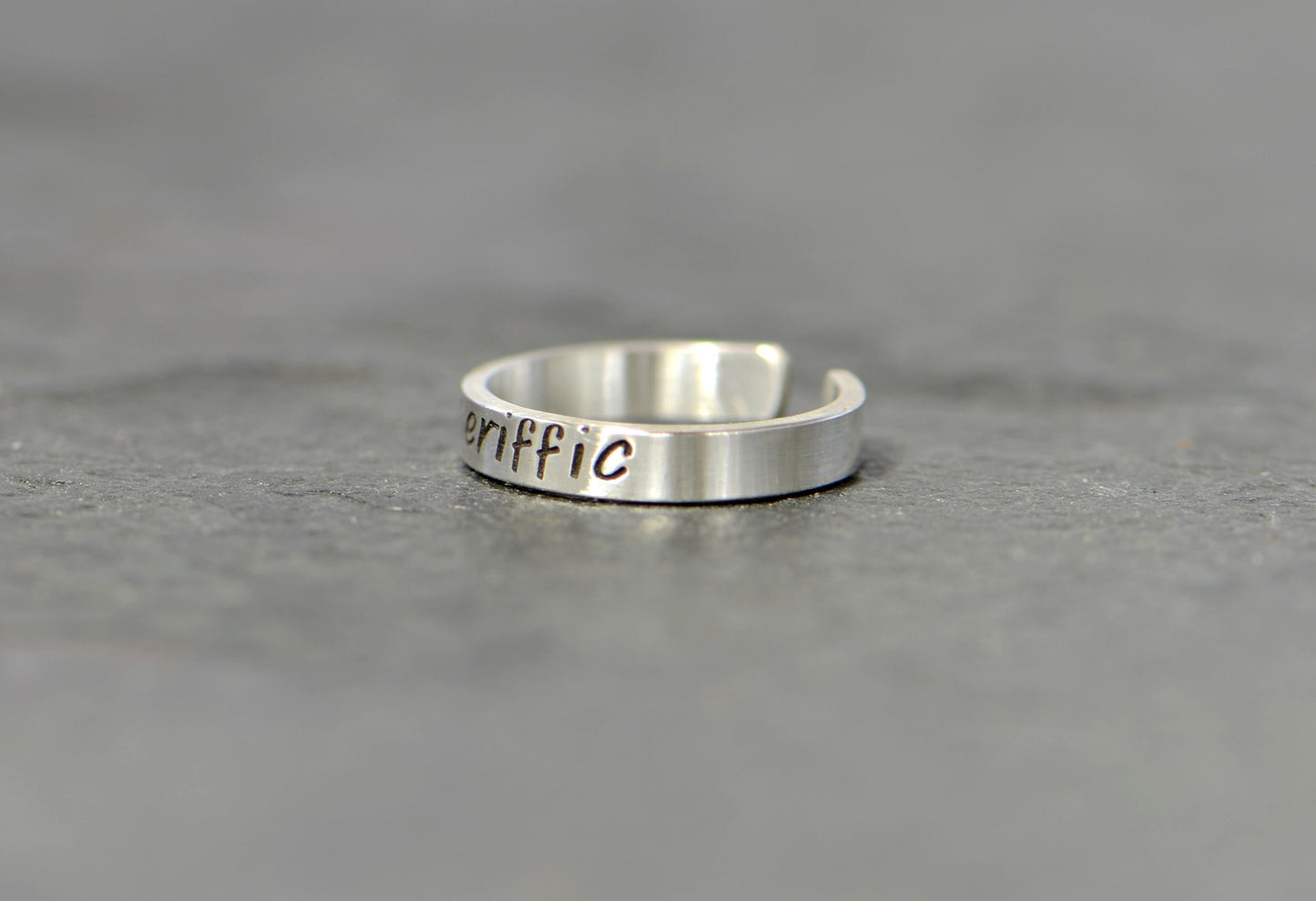 Sterling silver toe ring with "toeriffic"