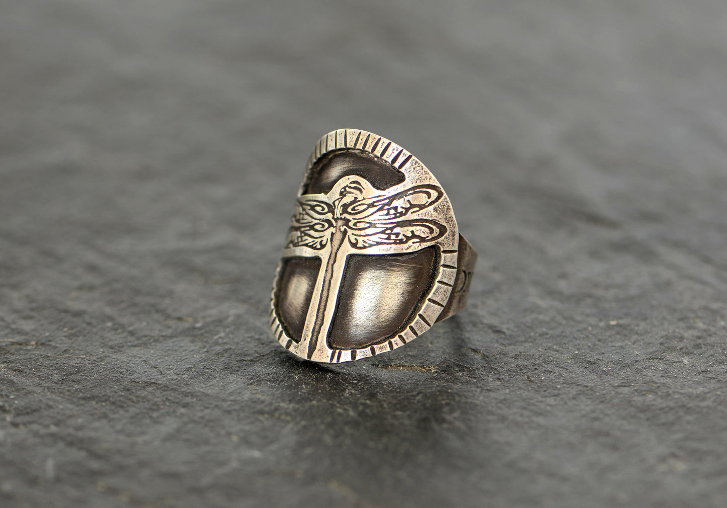 Sterling silver dragonfly design on a handcrafted saddle ring