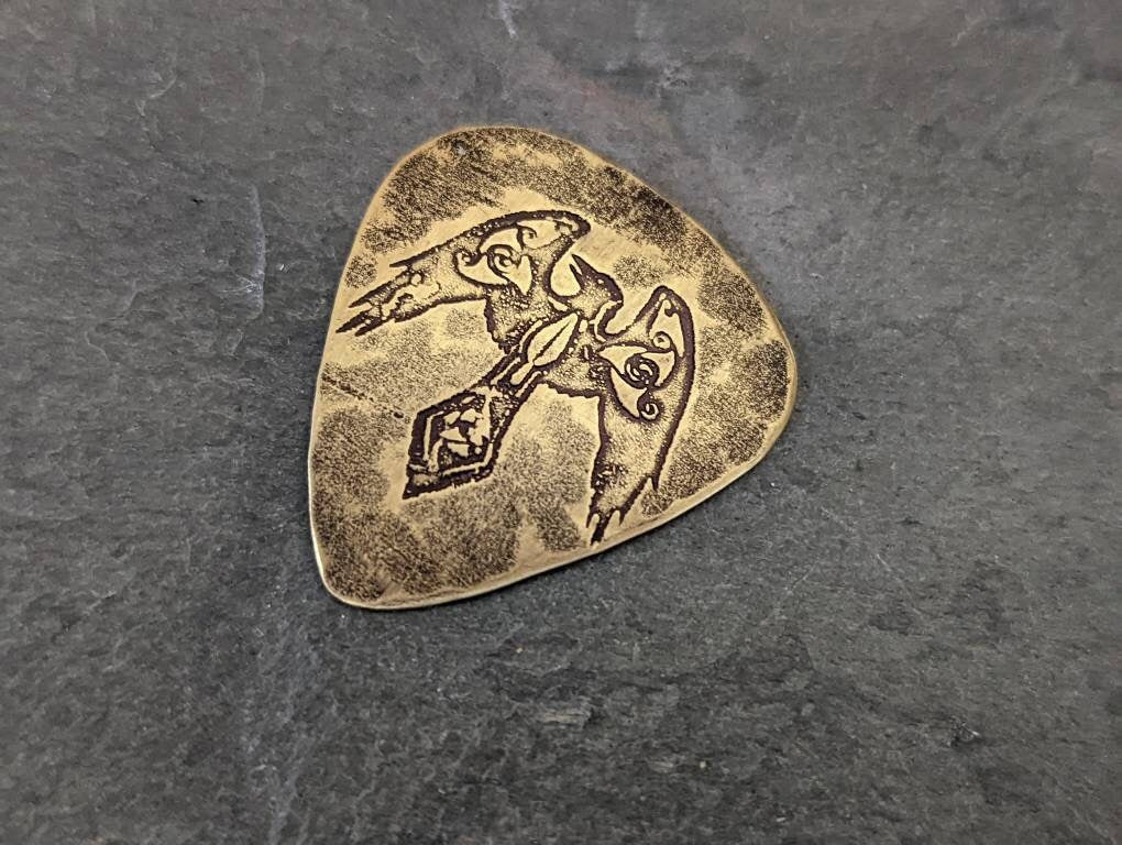 Bronze guitar pick with Norse raven aka Odins raven