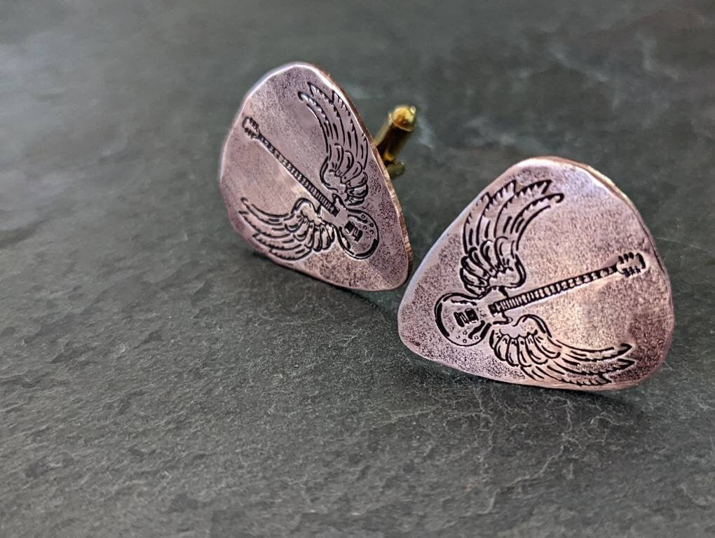 Winged guitar on copper guitar pick cuff links