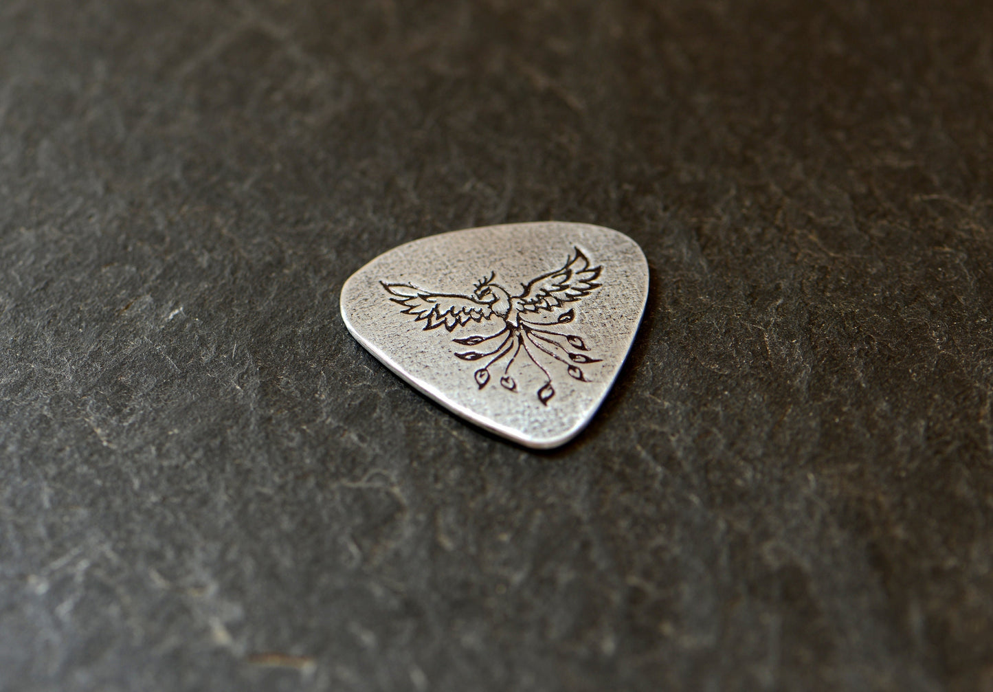 Phoenix on sterling silver guitar pick