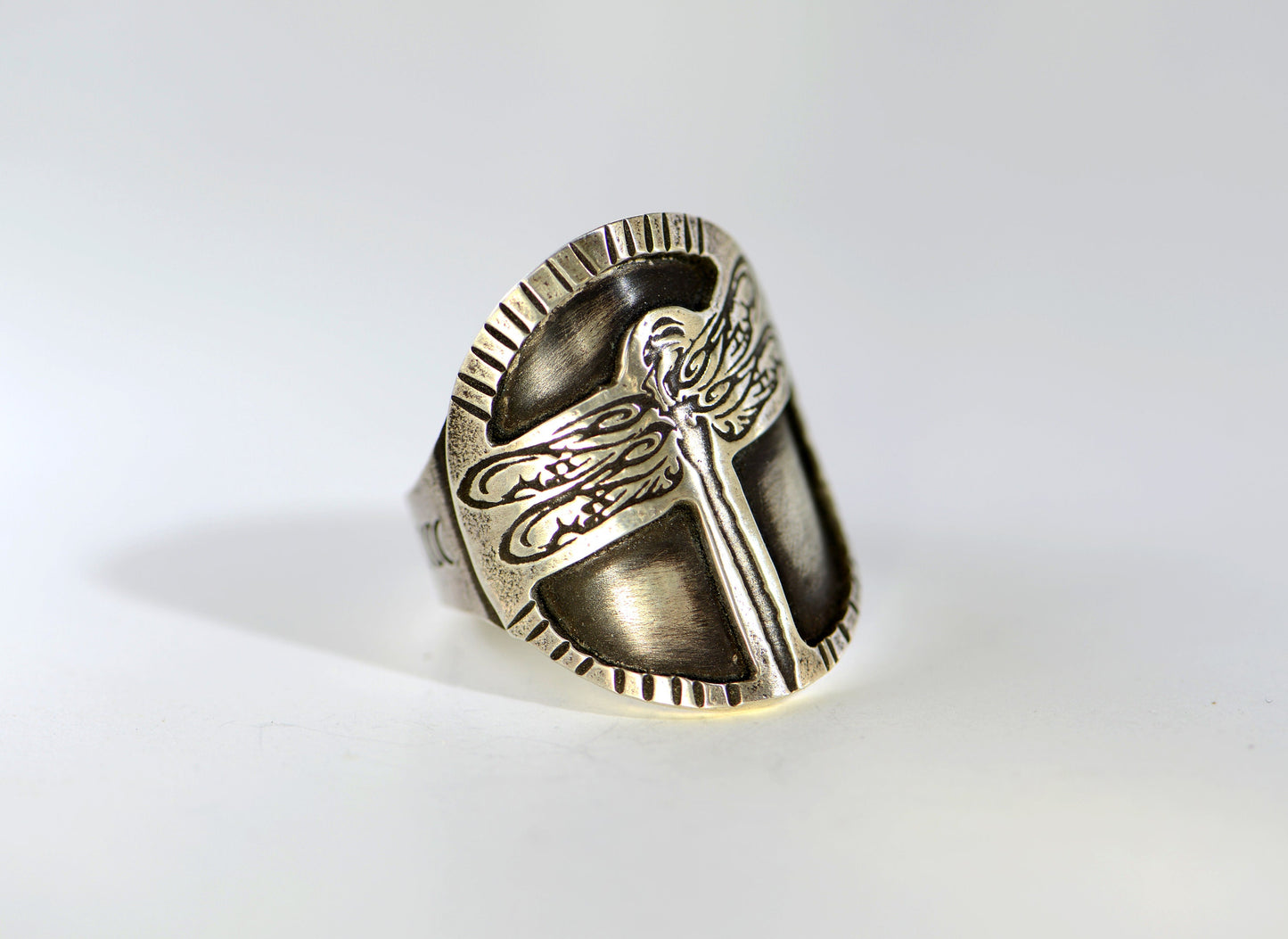 Sterling silver dragonfly design on a handcrafted saddle ring