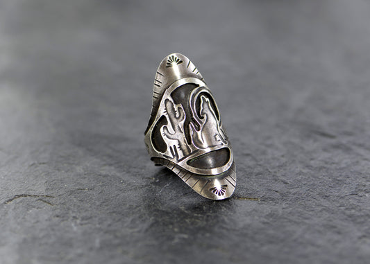 Saddle ring in sterling silver with howling coyote and Saguaro cactus