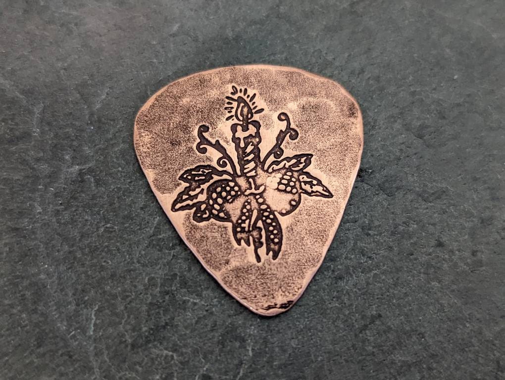 Guitar pick with Christmas Candle in bronze