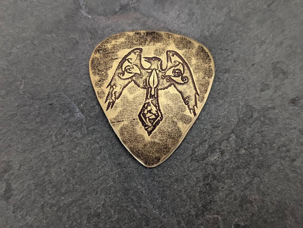 Bronze guitar pick with Norse raven aka Odins raven