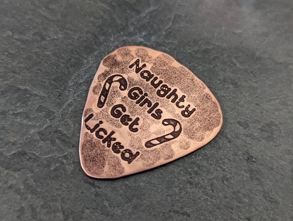 Copper guitar pick naughty christmas gift