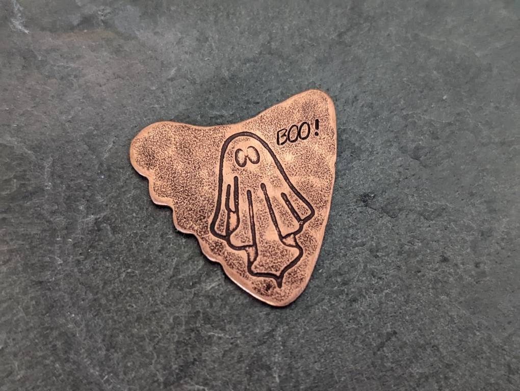 Copper shark tooth guitar pick with ghost and Boo