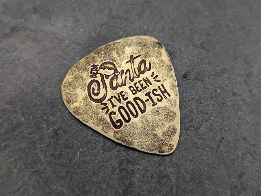Santa brass guitar pick