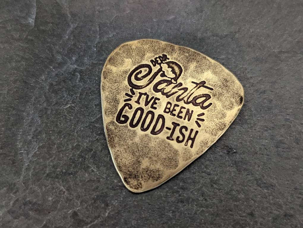 Santa brass guitar pick