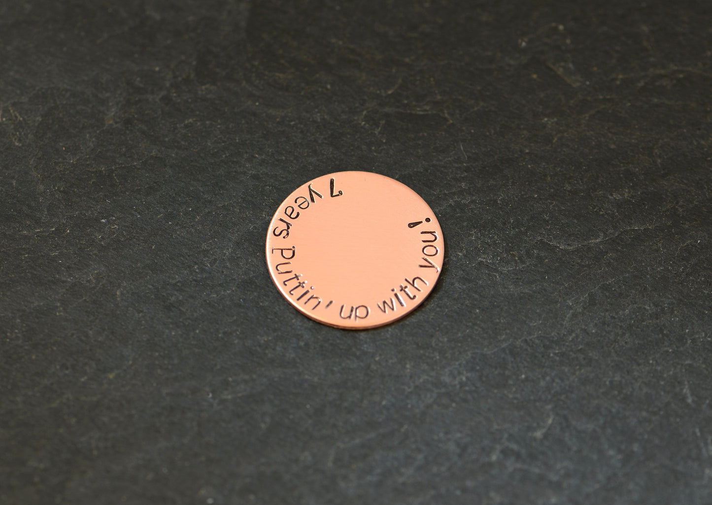 Copper golf ball marker for the 7th anniversary