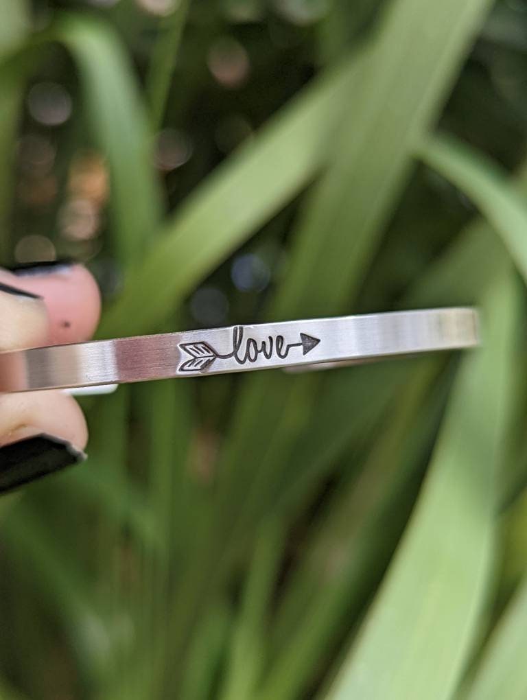 Dainty sterling silver bracelet with love and arrow