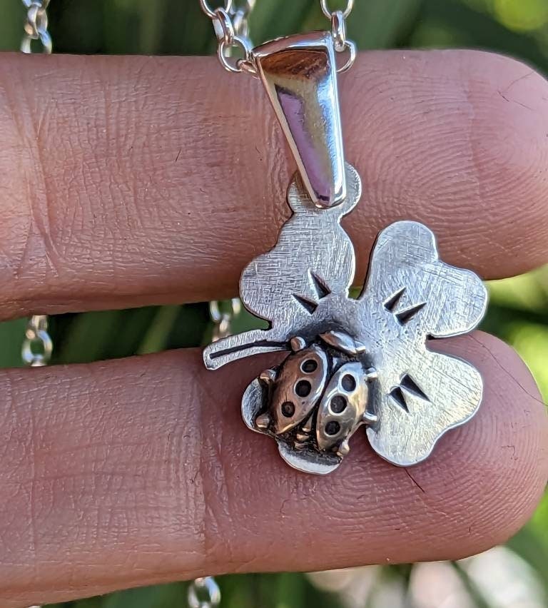 Sterling silver clover leaf and ladybug charm necklace