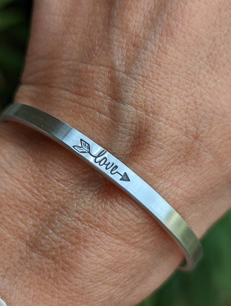 Dainty sterling silver bracelet with love and arrow