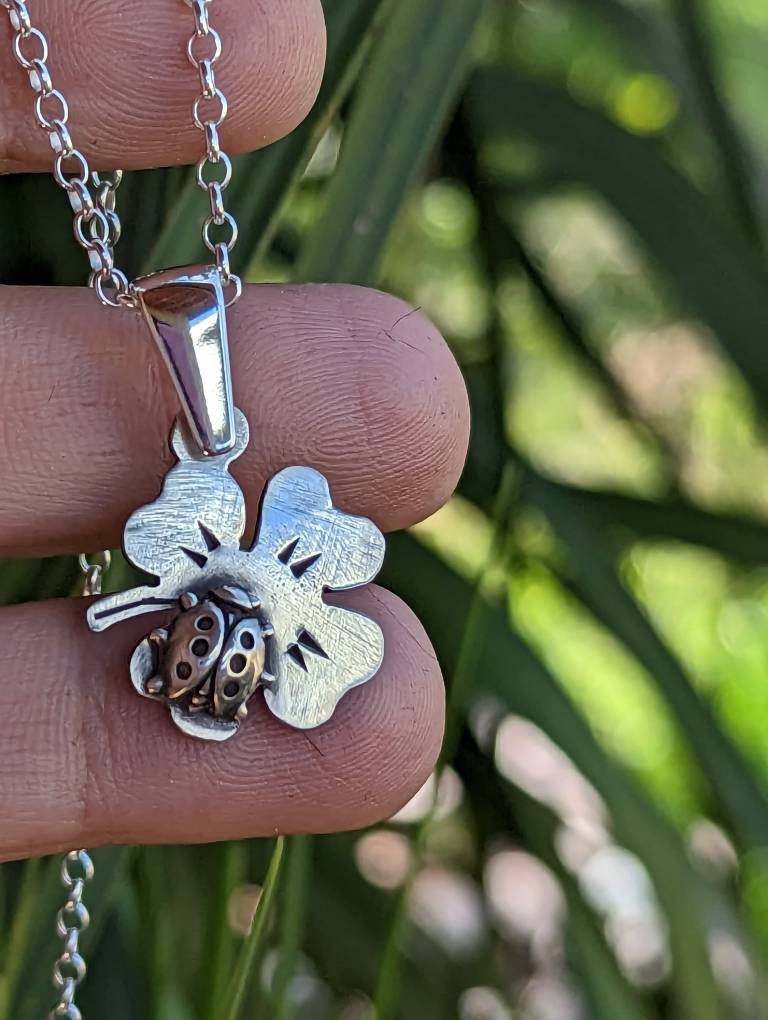 Sterling silver clover leaf and ladybug charm necklace