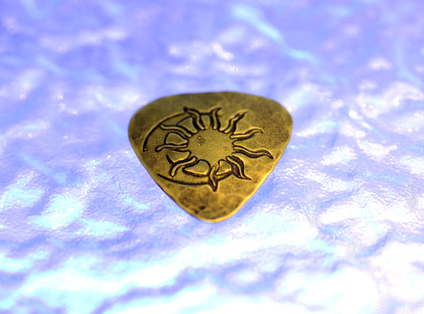 Sun and moon brass guitar pick - totally playable with hammered texture on back