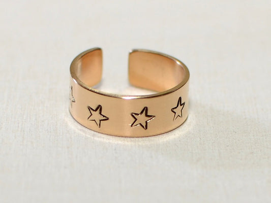 14K toe ring with stars stamped in solid gold