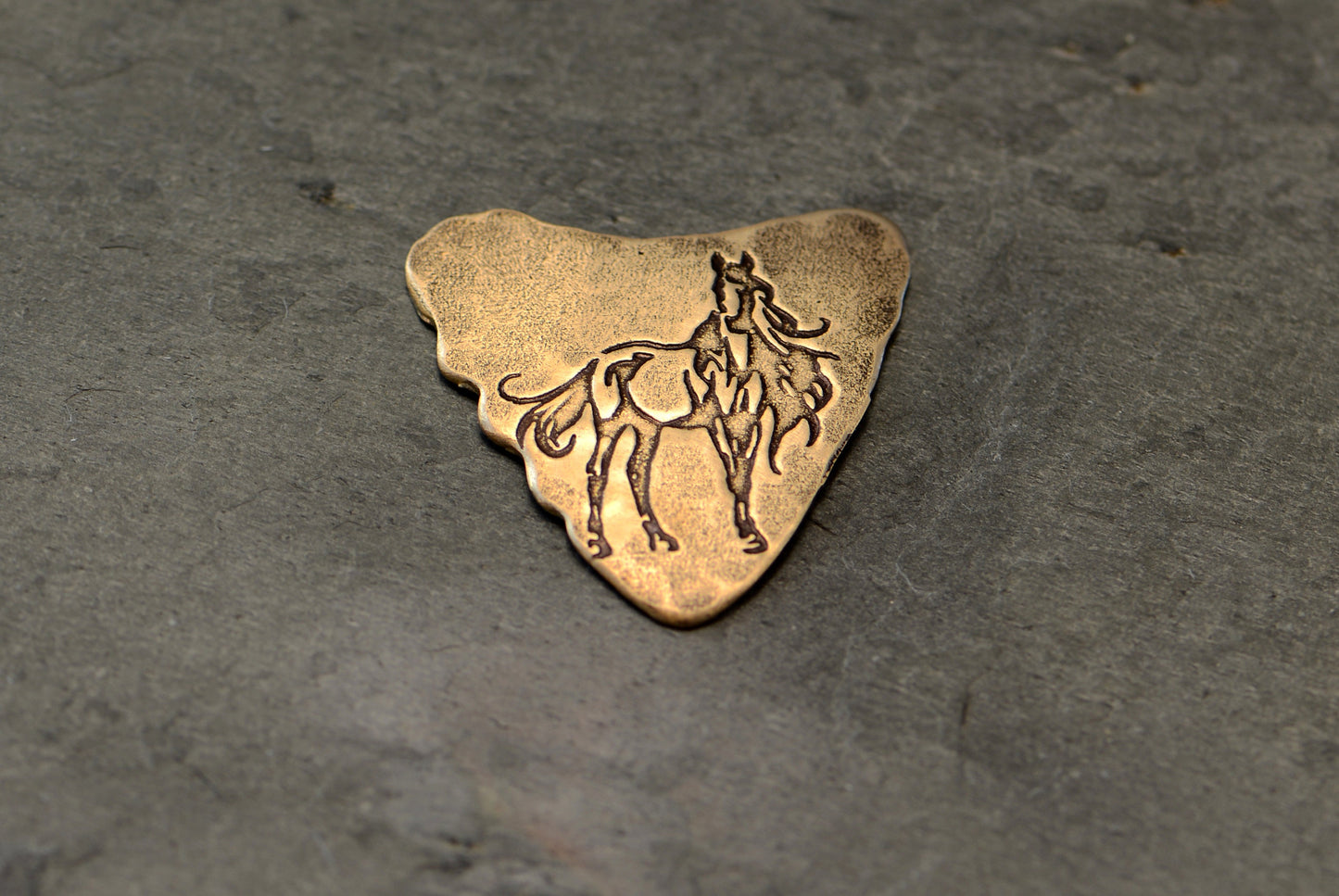 bronze shark tooth guitar pick - playable with horse