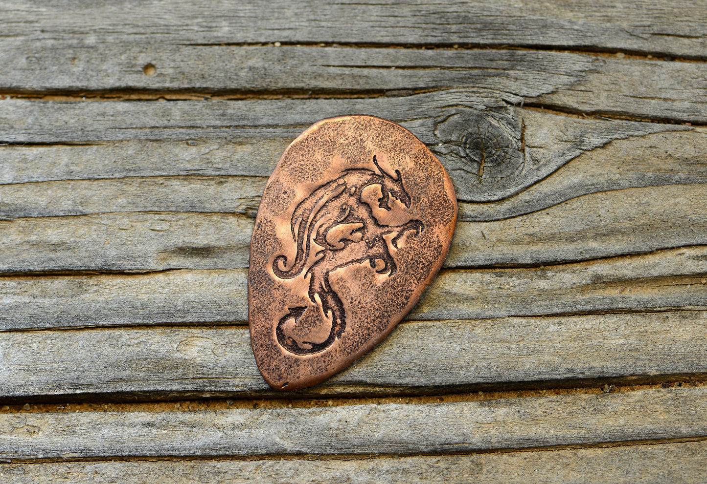 copper tear drop guitar pick with dragon - playable - NicisPicks