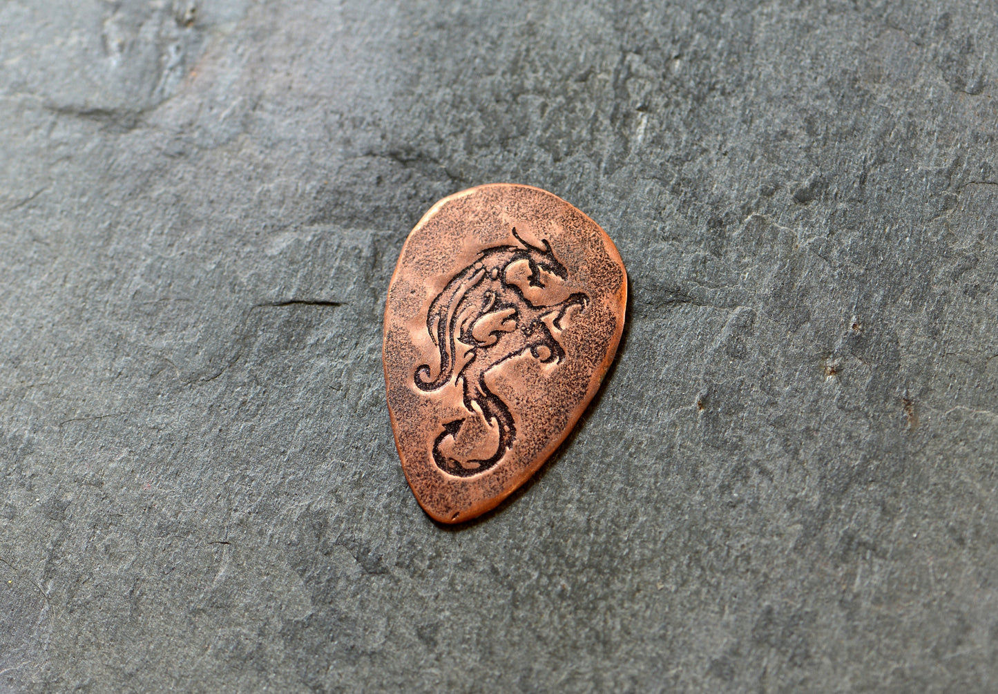 copper tear drop guitar pick with dragon - playable - NicisPicks
