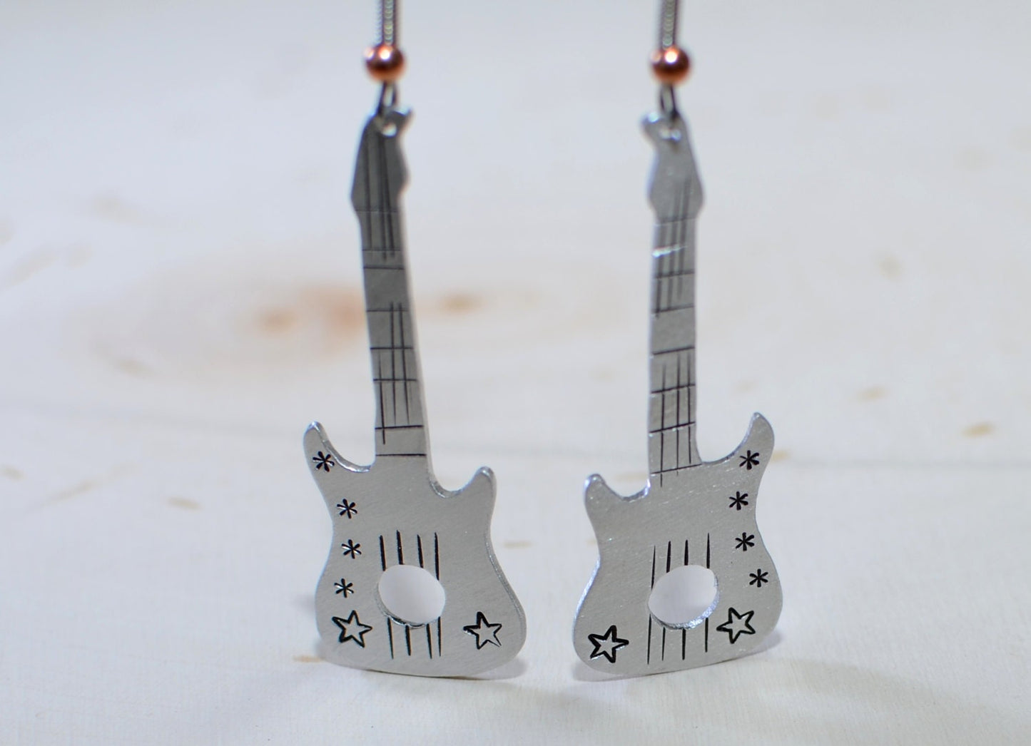 Guitar shaped handcrafted dangle earrings in your choice of aluminum or sterling silver