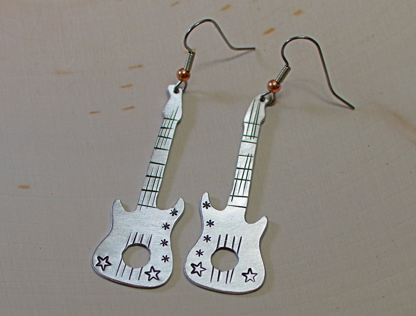 Guitar shaped handcrafted dangle earrings in your choice of aluminum or sterling silver