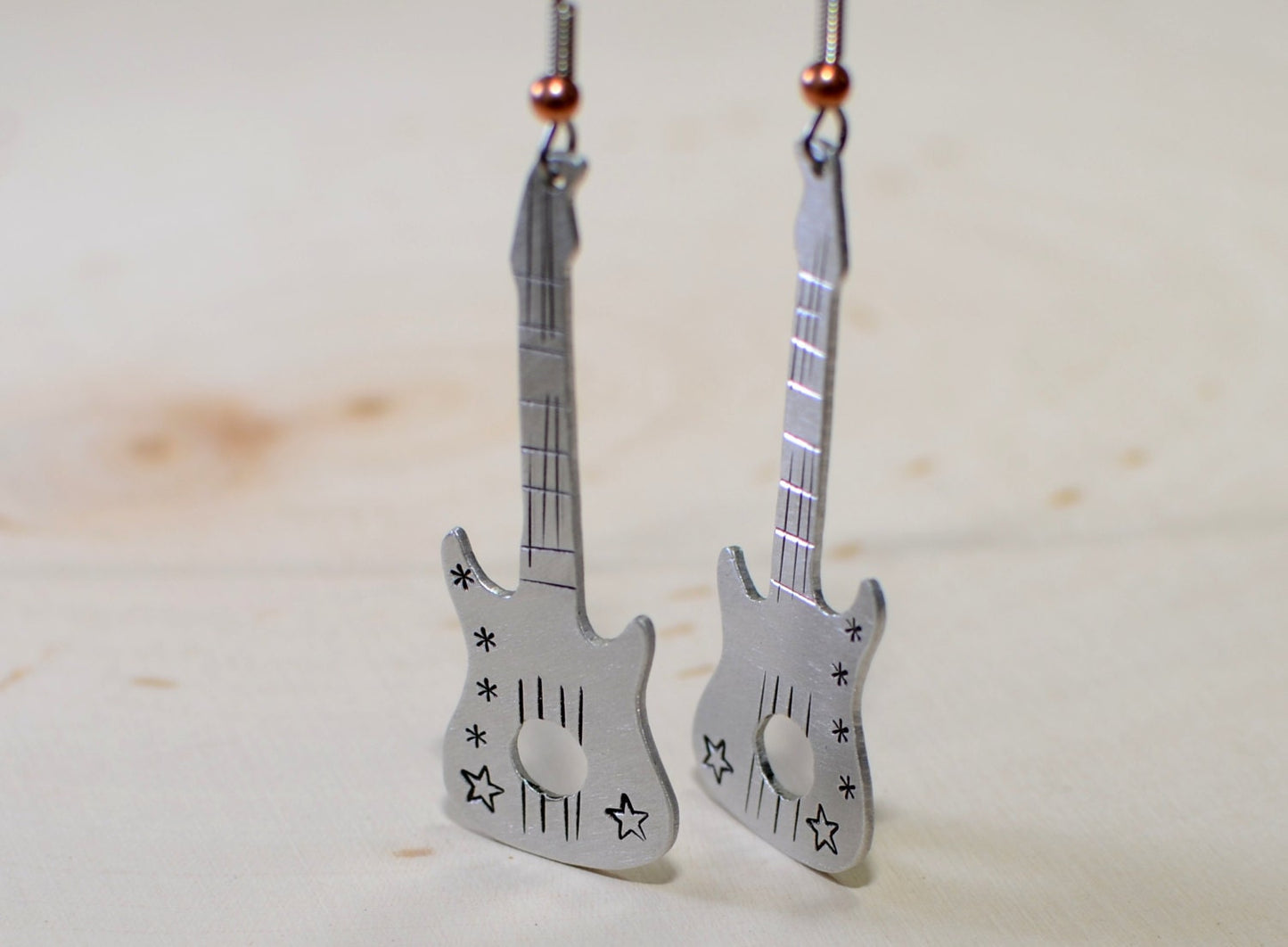 Guitar shaped handcrafted dangle earrings in your choice of aluminum or sterling silver