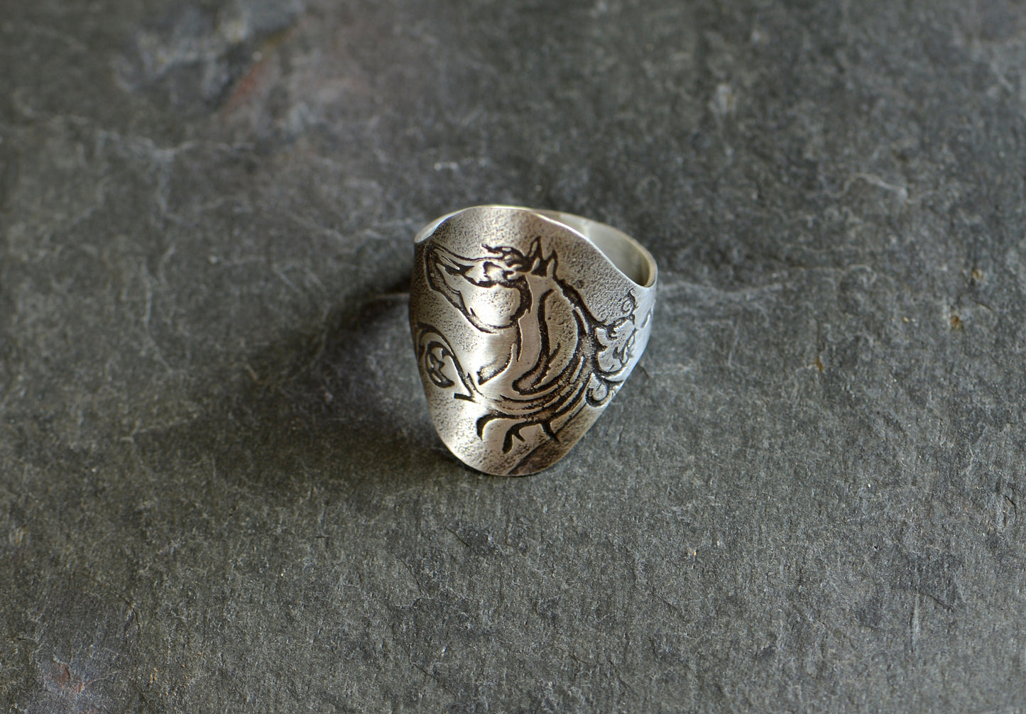 Saddle ring handcrafted in sterling silver with horse design