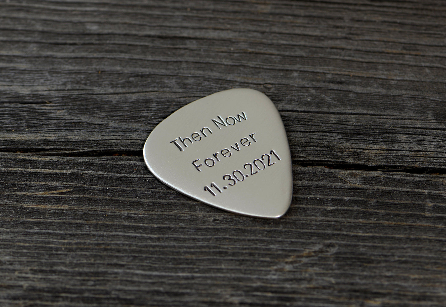 Then now and forever sterling silver guitar pick