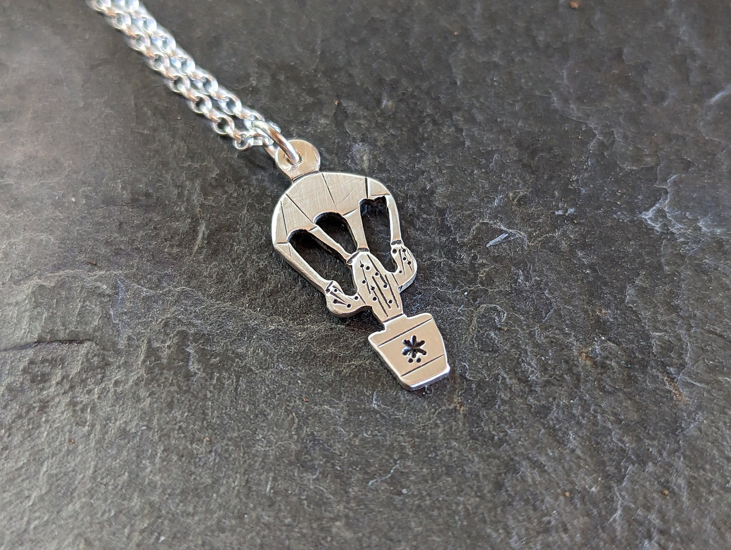 dainty sterling silver saguaro cactus charm on a parachute
