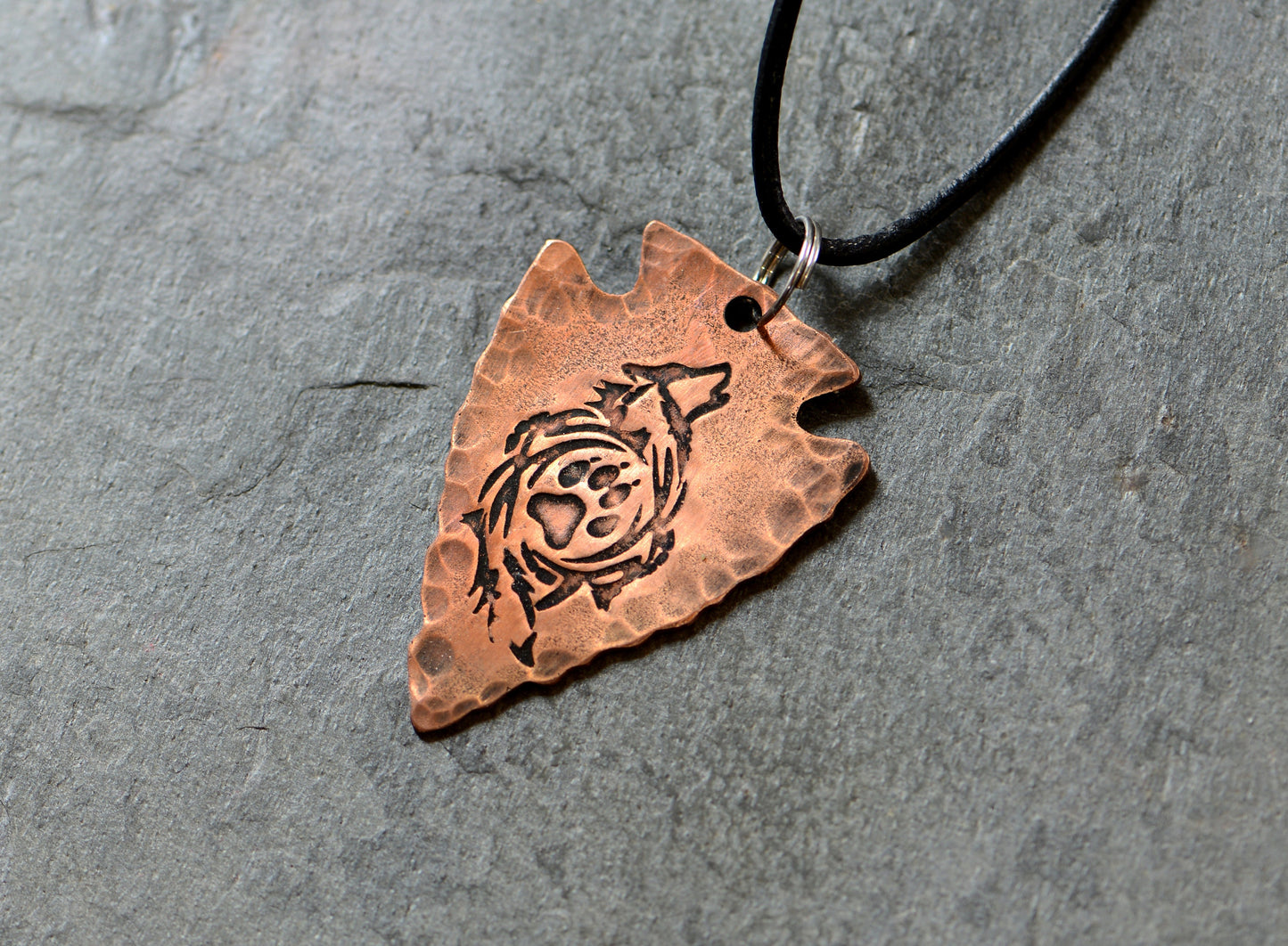 Arrowhead copper necklace  with howling wolf and paw