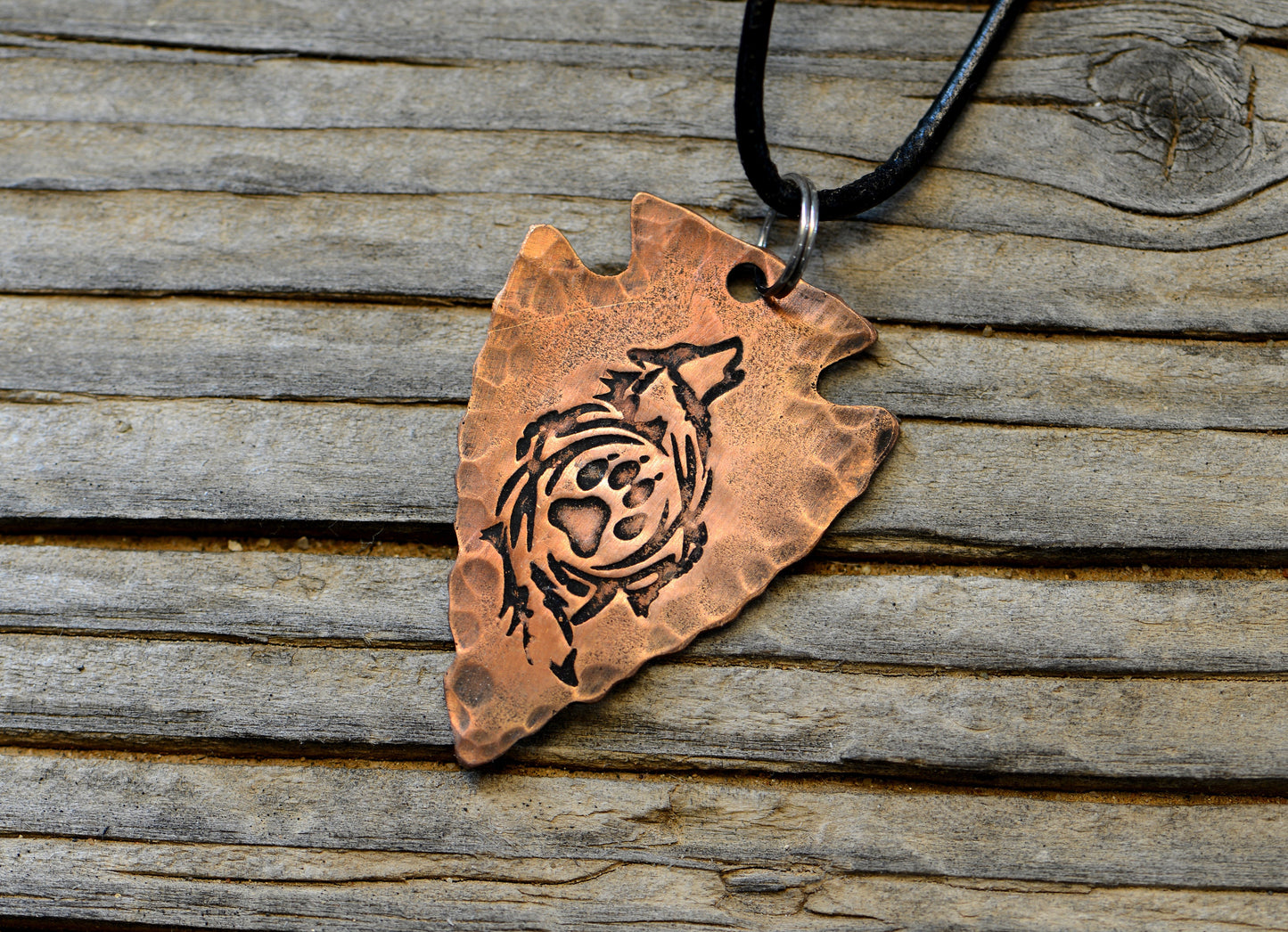 Arrowhead copper necklace  with howling wolf and paw