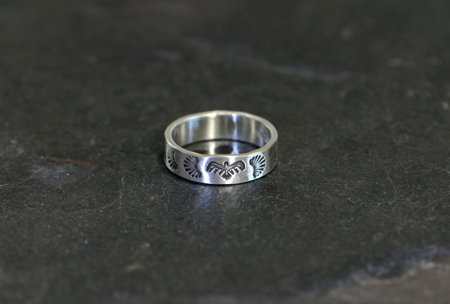 Sterling silver ring with Thunderbird pattern